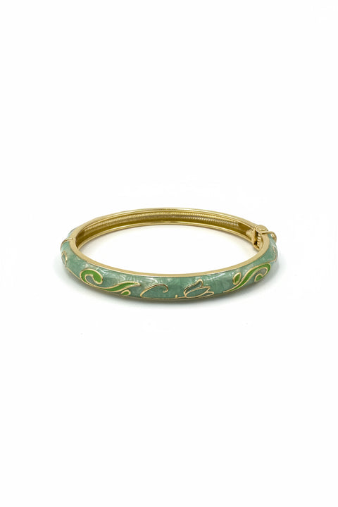 Bracciale rigido colore verde e oro con dettagli floreali verde