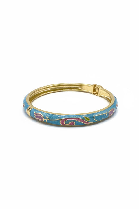 Bracciale rigido colore azzurro con dettagli rosa