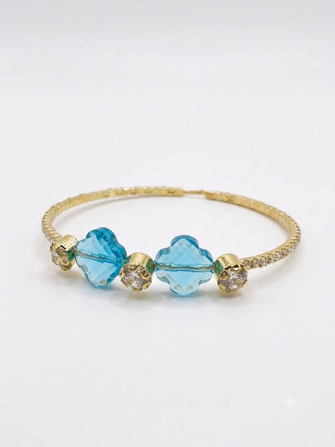 BRACCIALE A MOLLA STRASS E PIETRA FIORE AZZURRA/GOLD