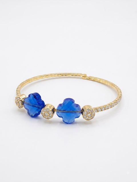 BRACCIALE A MOLLA STRASS E PIETRA FIORE BLU/GOLD